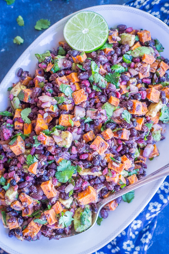 Roasted Sweet Potato Salad with Pomegranate, Black Beans and Avocado from She Likes Food