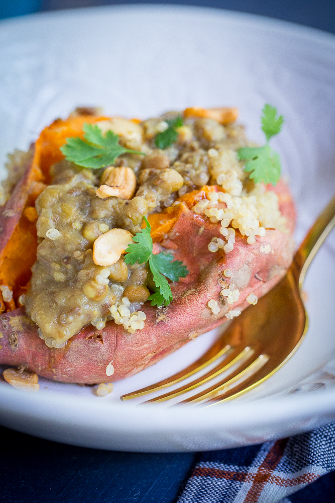 Curried Lentil & Quinoa Stuffed Sweet Potatoes from She Likes Food